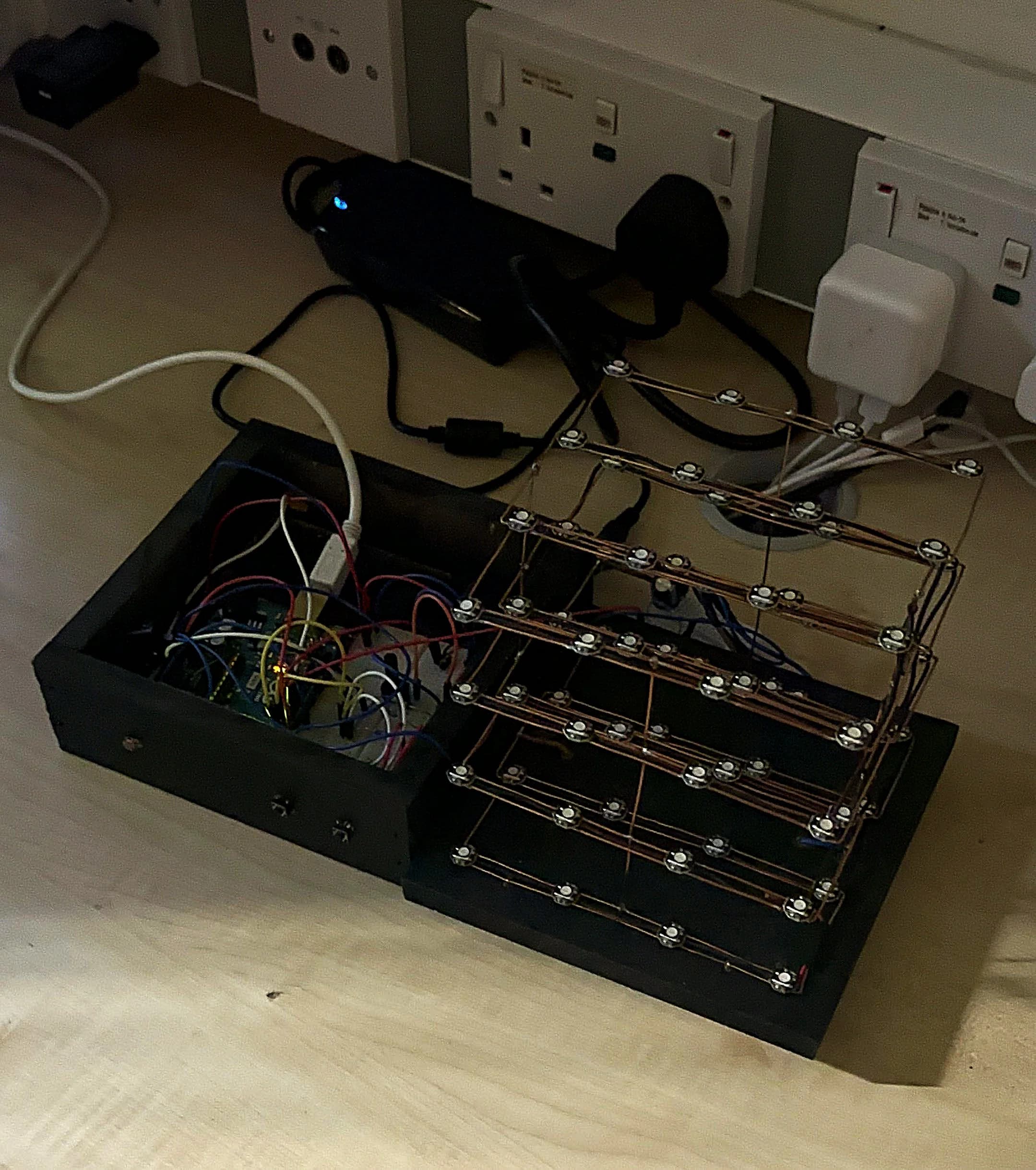 4x4x4 NeoPixel LED Cube showing an active animation